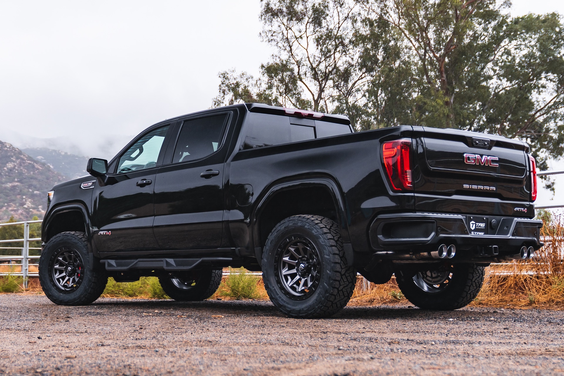 Sierra AT4 with AWE Exhaust on Fuel Wheels