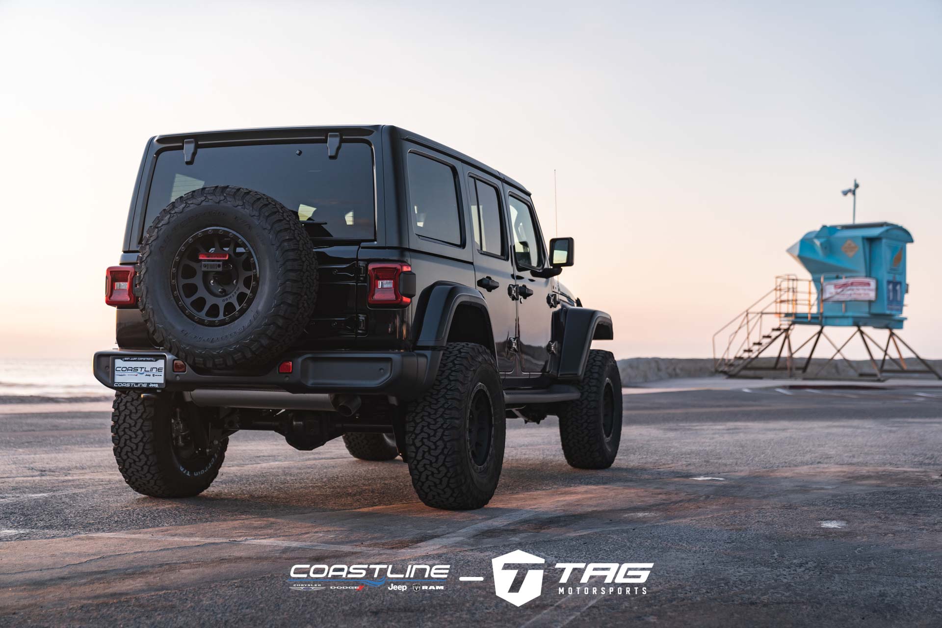 Wrangler Lifted on Method Wheels at the Beach