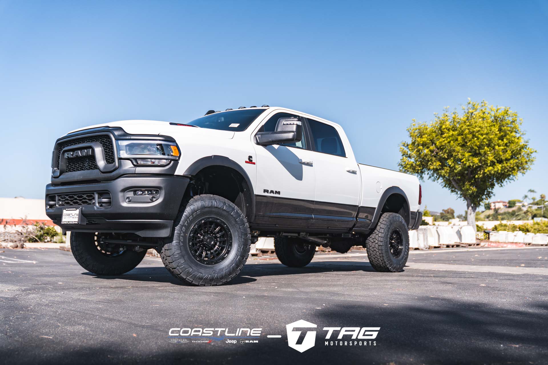 2500 Rebel Lifted on Vorsteiner Wheels