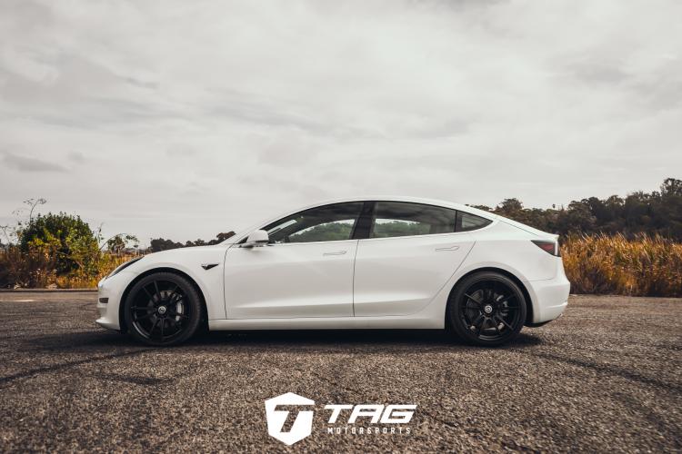 White Model 3 on FlowForm FF04 Wheels